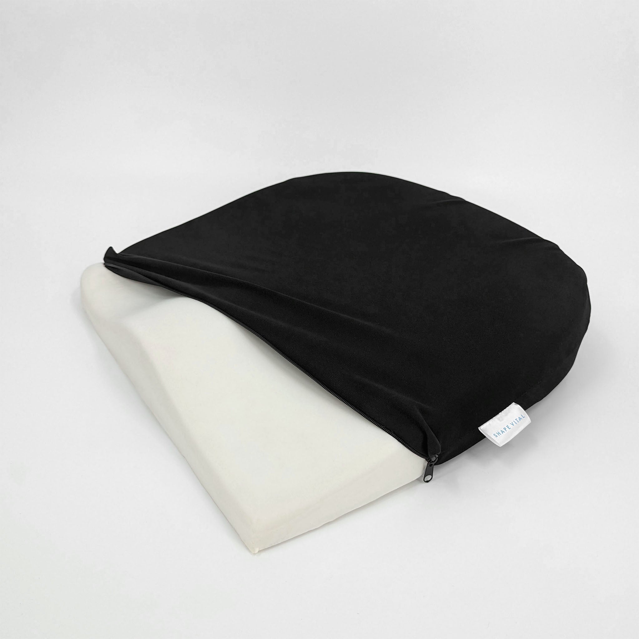 Coussin d'assise ergonomique en forme de cale